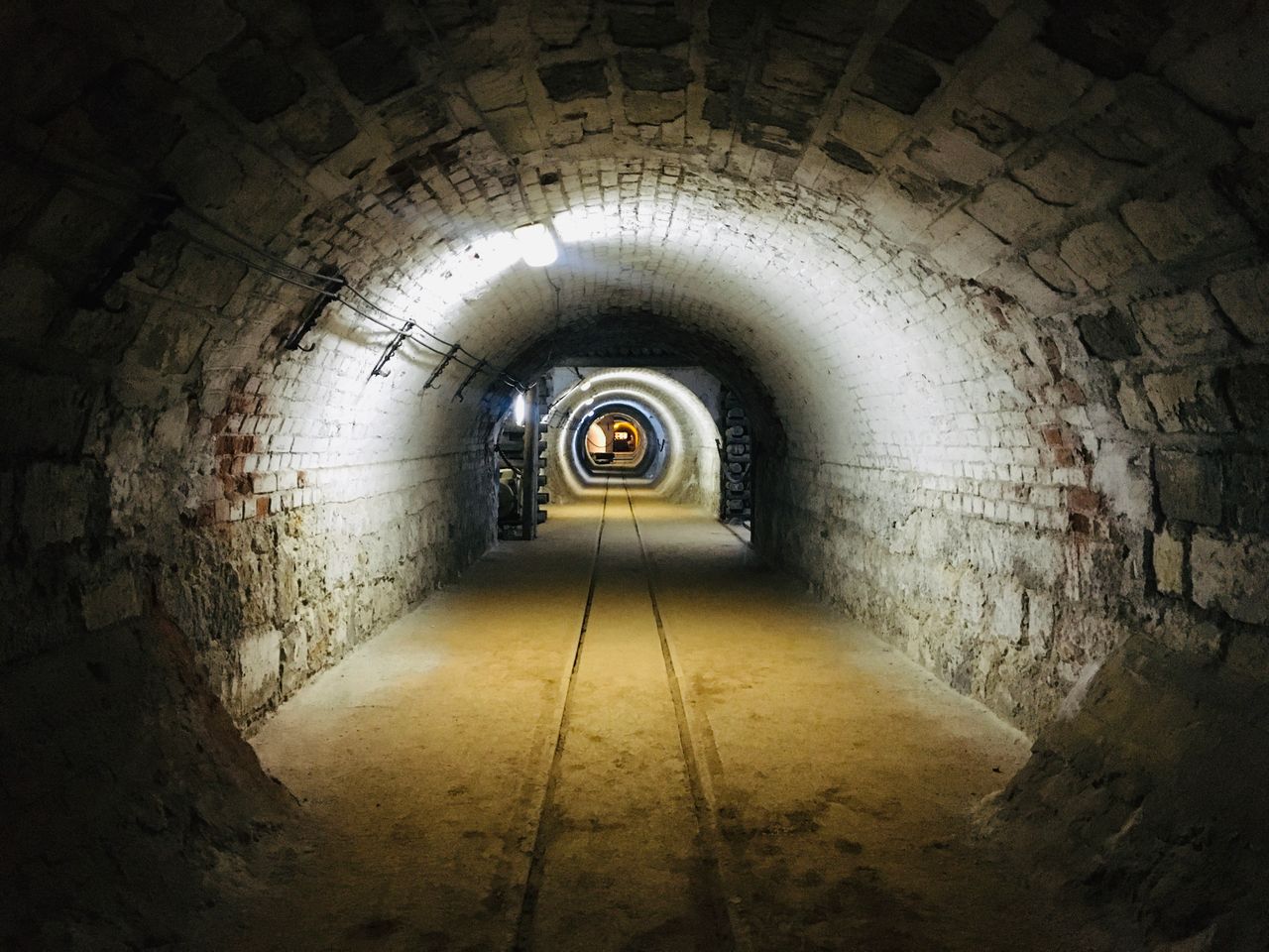Mastering the First Impression: Your intriguing post title goes here Explore the eerie atmosphere of a dimly lit underground tunnel, perfect for mystery or adventure themes.
